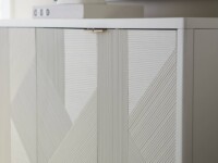 Rowe - White Console Table With Geometric Ribbed Panel Doors Under Wooden Console Table Near Large Mirror Home Decor