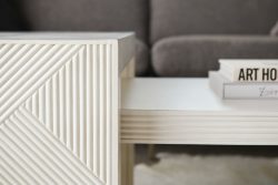 Rowe - White Geometric Ribbed Coffee Table With Books Near Grey Sofa Home Decor