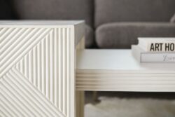 Rowe - White Geometric Ribbed Coffee Table With Books Near Grey Sofa Home Decor