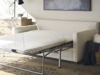 Rowe - White Sofa Bed With Pull-Out Mattress Under Wooden Console Table Near Large Mirror