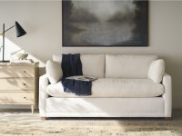 Rowe - White Sofa With Plush Cushions Under Abstract Art Near Wooden Console Table Home Decor