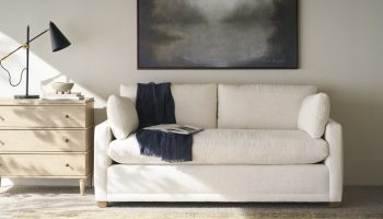 Rowe - White Sofa With Plush Cushions Under Abstract Art Near Wooden Console Table Home Decor