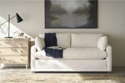 Rowe - White Sofa With Plush Cushions Under Abstract Art Near Wooden Console Table Home Decor