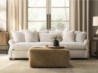 Rowe - White Sofa With Plush Cushions Under Large Window Near Wooden Console Table, Beige Ottoman, Home Decor