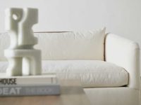 Rowe - White Sofa With Plush Cushions Under Wooden Console Table With Books Home Decor