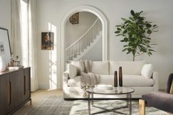 Rowe - White Sofa With Throw Blanket Under Archway Near Wooden Console Table, Large Plant, Home Decor, Upholstery