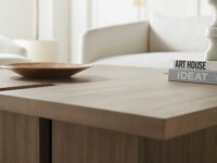 Rowe - Wooden Coffee Table With Books And Bowl Under White Sofa Near Large Mirror Home Decor