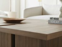 Rowe - Wooden Coffee Table With Books And Bowl Under White Sofa Near Large Mirror Home Decor