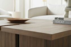 Rowe - Wooden Coffee Table With Books And Bowl Under White Sofa Near Large Mirror Home Decor
