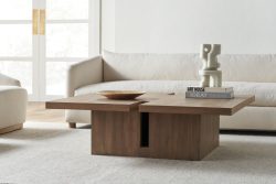 Rowe - Wooden Coffee Table With Books And Sculpture In Front Of White Sofa Home Decor