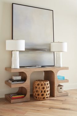 Rowe - Wooden Console Table With White Lamps Geometric Cutouts Books And Woven Basket Home Decor