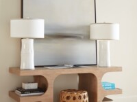 Rowe - Wooden Console Table With White Lamps Geometric Cutouts Books And Woven Basket Home Decor