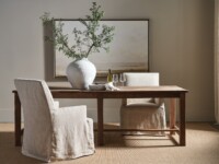 Rowe - Wooden Dining Table With Beige Slipcovered Chairs, White Vase Centerpiece, Under Framed Art, Home Decor