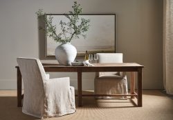 Rowe - Wooden Dining Table With Beige Slipcovered Chairs, White Vase Centerpiece, Under Framed Art, Home Decor