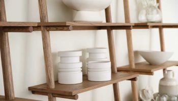 Rowe - Wooden Shelves With White Ceramic Bowls And Vases Home Decor